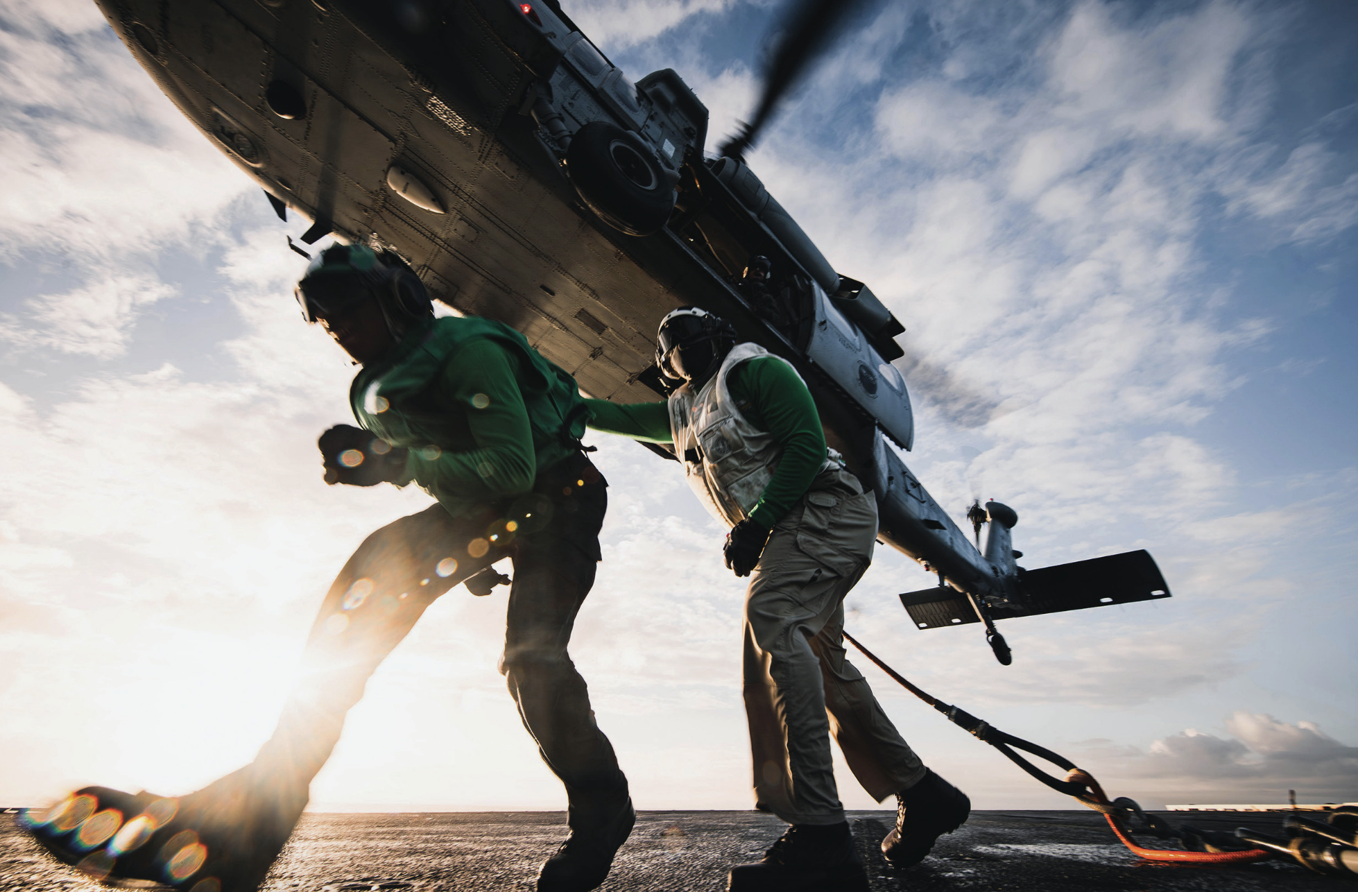 MH-60S Seahawk assigned to Helicopter Sea Combat Squadron 5 picks up nets from flight deck during vertical replenishment aboard USSGeorge Washington while underway in Pacific Ocean, June 14, 2024 (U.S. Navy/Nicholas Russell)